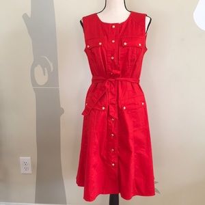 Red sleeveless dress with tie belt